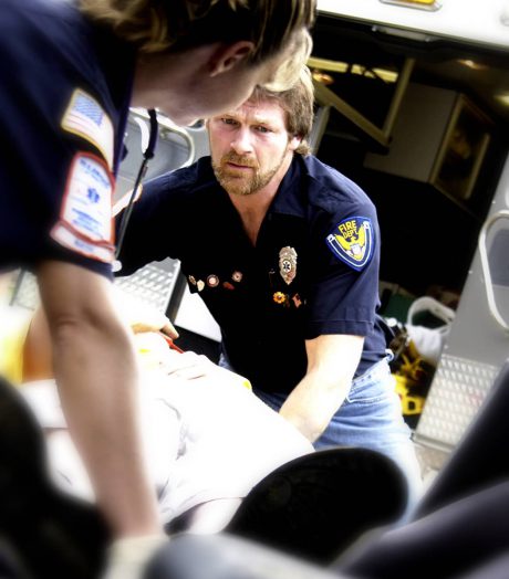 Paramedics helping an accident victim